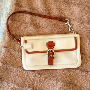 COACH WRISTLET with small button front pocket